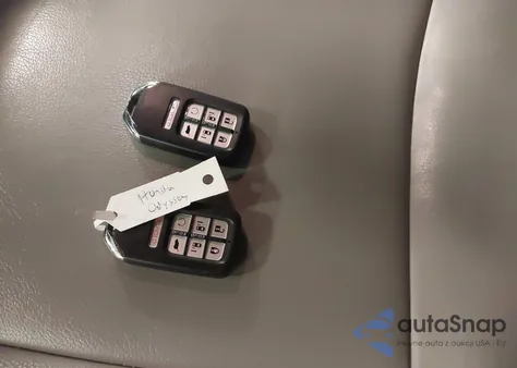 2019 Honda Odyssey Touring z USA, uszkodzony, nr VIN 5FNRL6H82KB027149